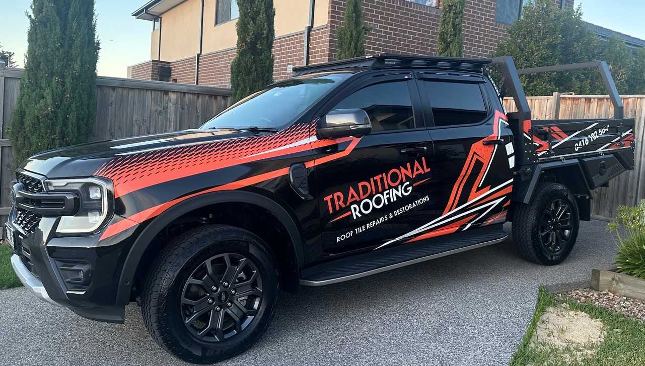 The Traditional Roofing work ute parked outside a Melbourne home